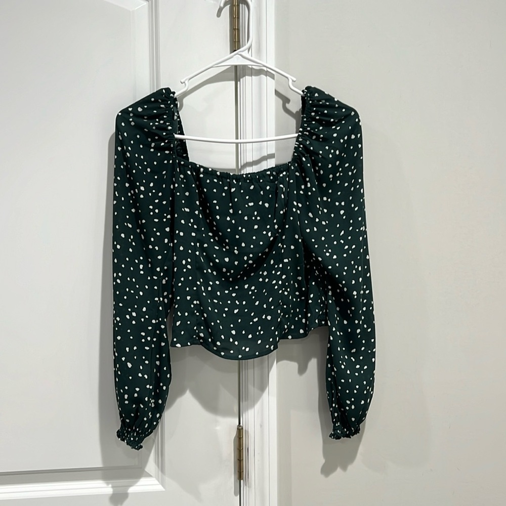 Green and white stretchy blouse